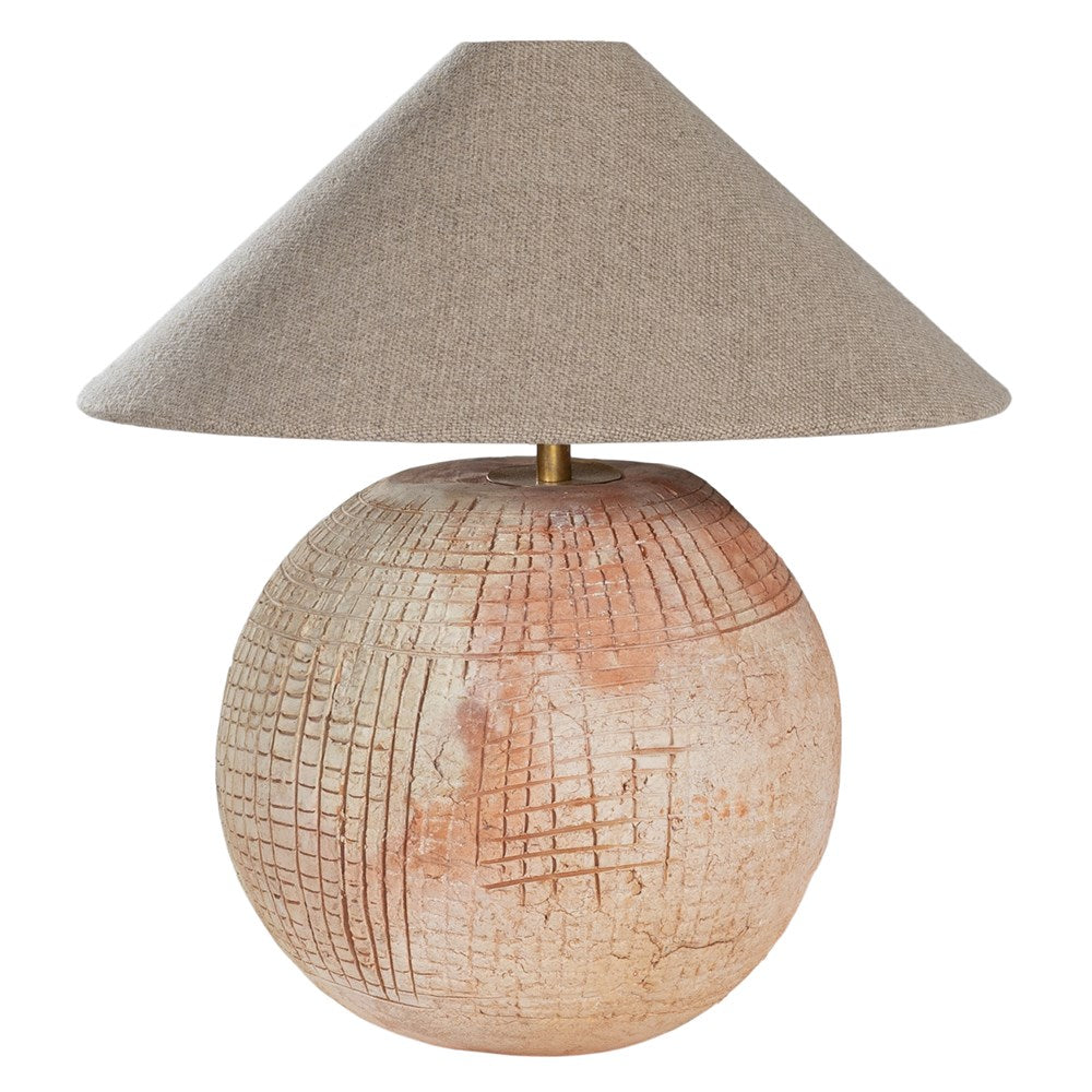 Terracotta table lamp featuring a textured spherical base with intricate grid detailing and a wide conical fabric shade in a neutral tone