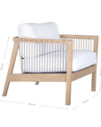 Wooden accent chair with white cushions and sleek spindle detailing, perfect for modern coastal and relaxed living spaces