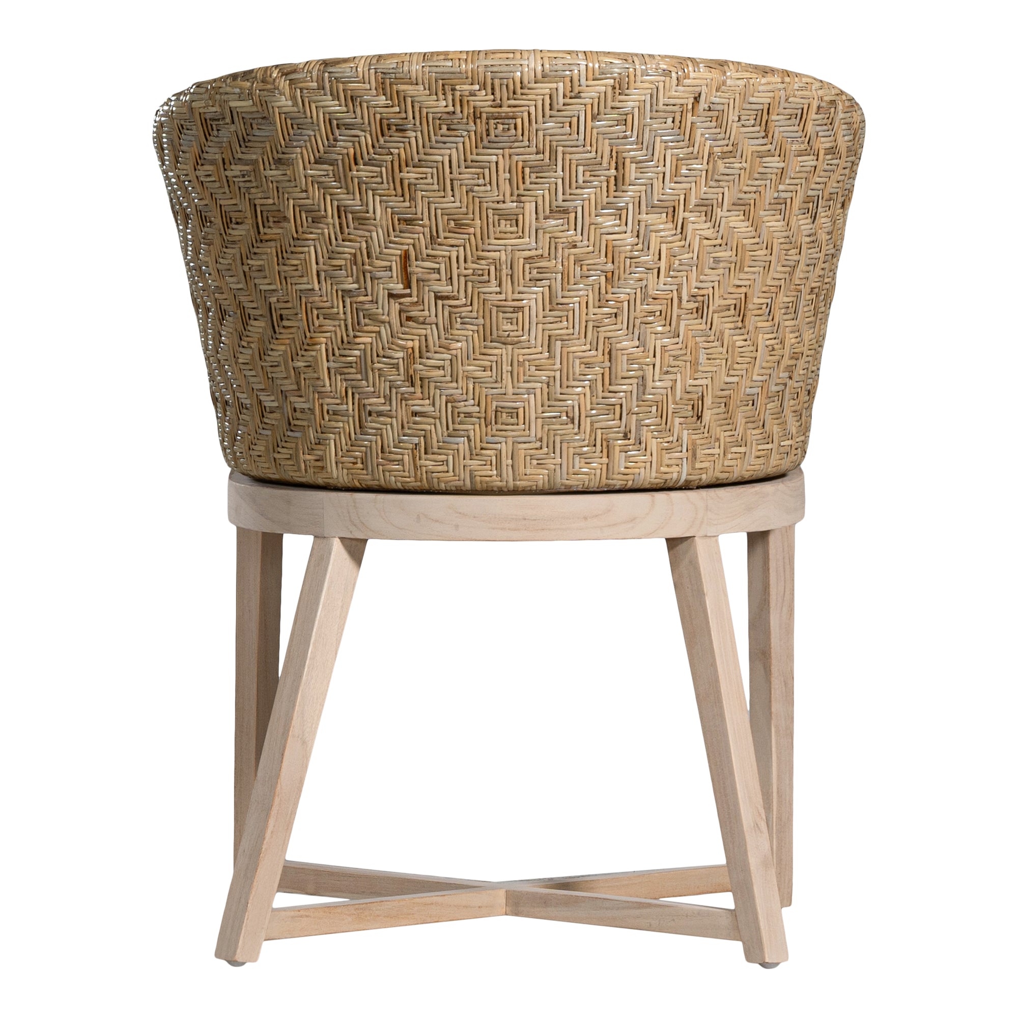 KULALA Living handwoven rattan dining chair with a curved backrest, natural wood legs, and a neutral seat cushion, blending coastal and contemporary design