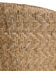 KULALA Living handwoven rattan dining chair with a curved backrest, natural wood legs, and a neutral seat cushion, blending coastal and contemporary design