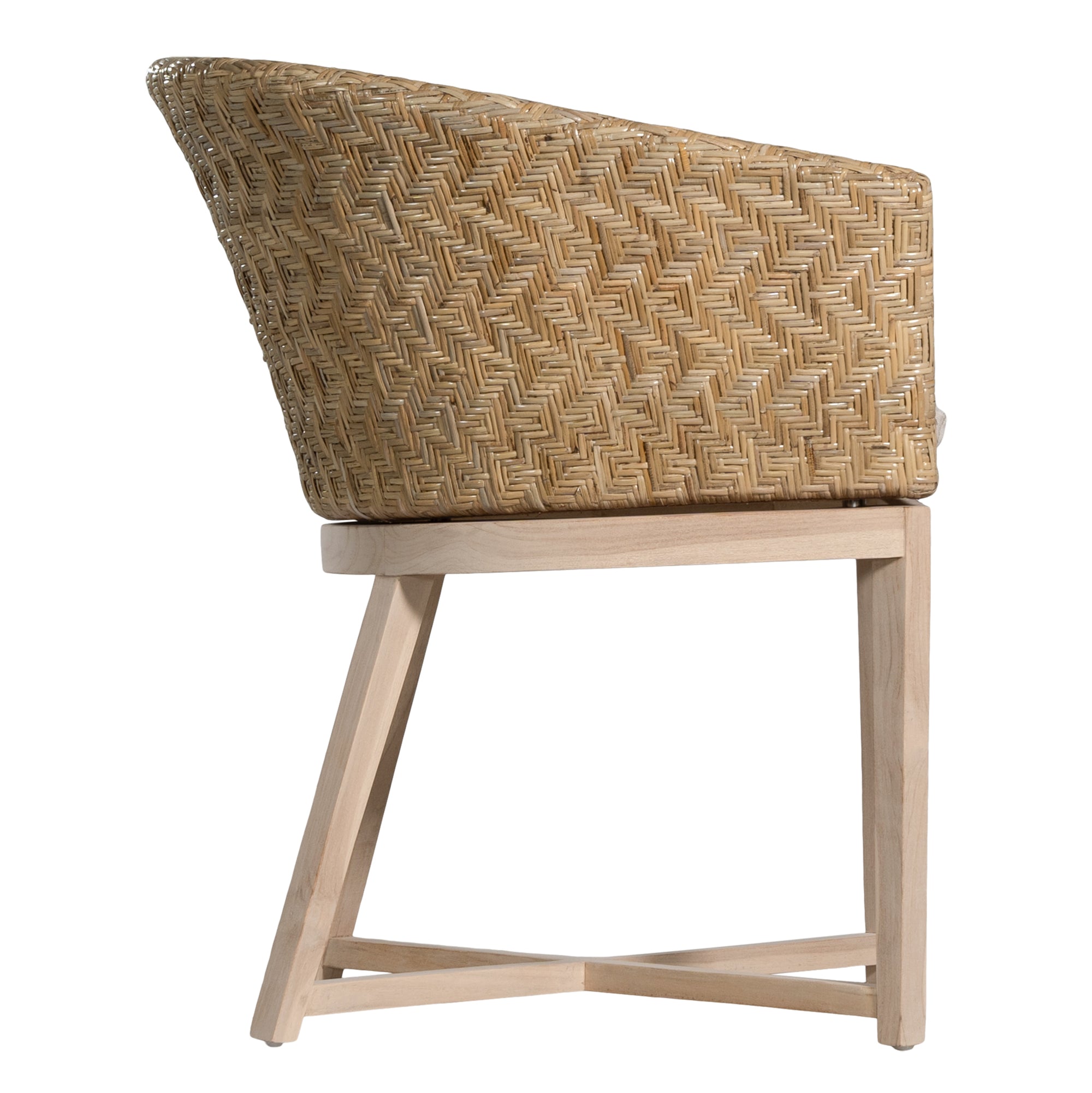 KULALA Living handwoven rattan dining chair with a curved backrest, natural wood legs, and a neutral seat cushion, blending coastal and contemporary design